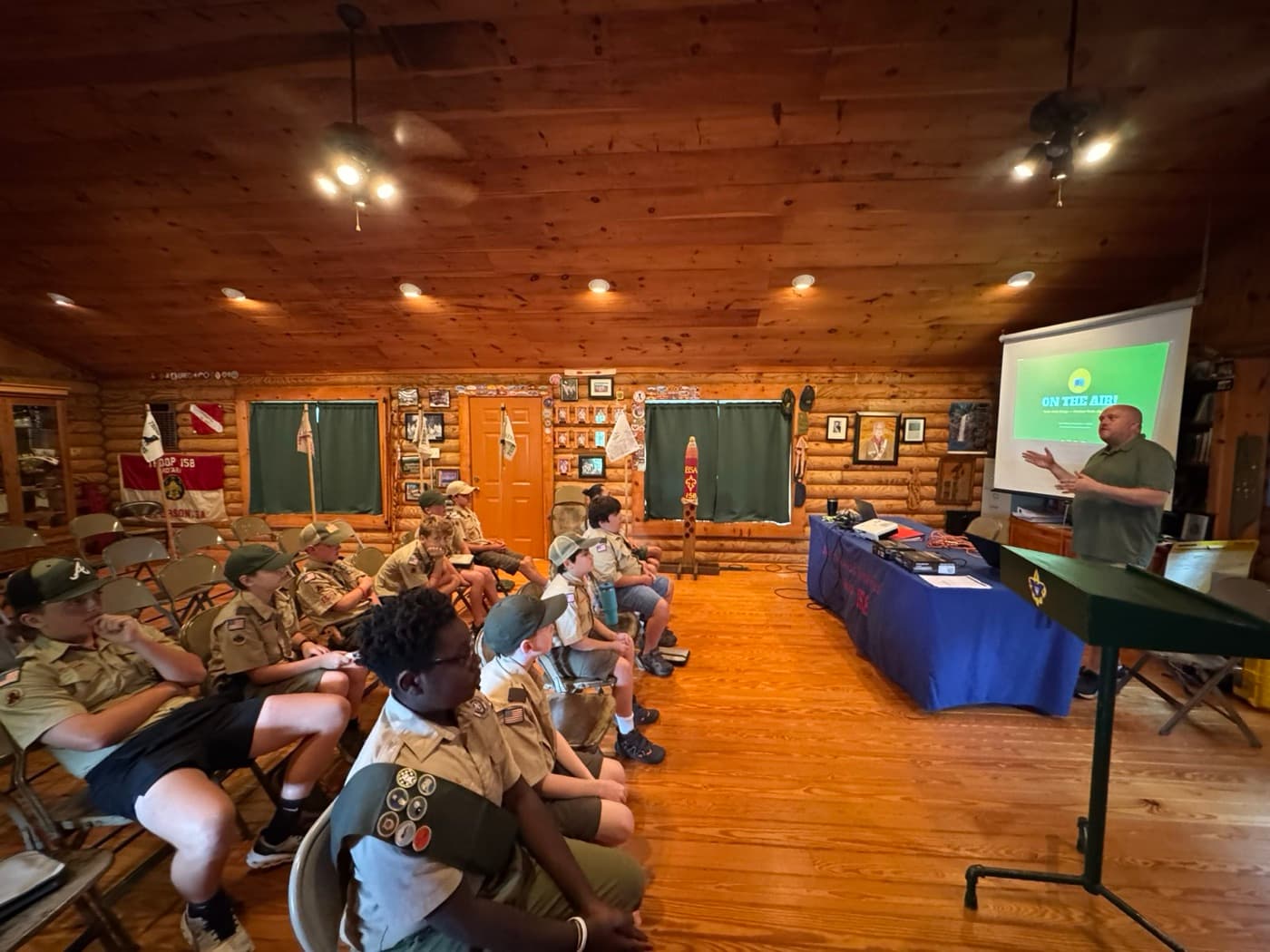 Chris Hetherington presenting the “On the Air!” Radio Merit Badge session to seated Scouts